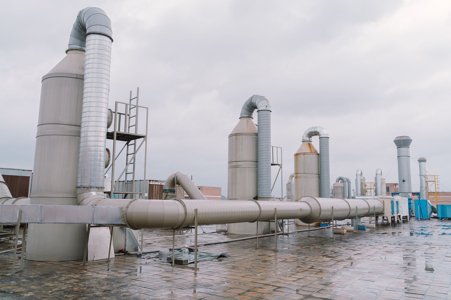 Rooftop exhaust treatment equipment for compliant paint-emission control